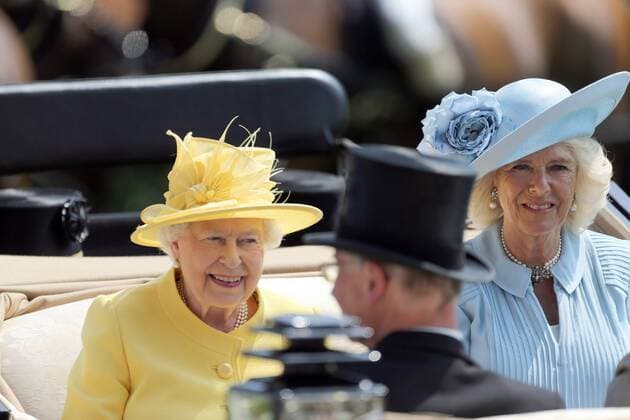 Her Majesty The Queen and The Duchess of Cornwall are pictured as they arrive by horse and carriage at day two of Royal Ascot 2017 in Ascot, England, as one of the leading horse racing events in the United Kingdom continues. The Queen sports a summery look as she enjoys the golden sunshine as she arrives in a yellow hat and overcoat. JUNE 21st 2017  MTXx171310