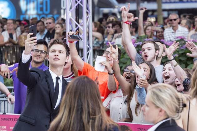 London, UK. 21 June 2017. Actor Ansel Elgort takes a selfie with fans at the European Premiere of Baby Driver directed by Edgar Wright. Baby Driver, European Premiere, London, UK 