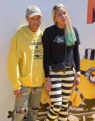 Musician Pharrell Williams (L) and his wife, model Helen Lasichanh attends the premiere of the animated motion picture comedy Despicable Me 3 at the Shrine Auditorium in Los Angeles on June 24, 2017. Storyline: A mysterious stranger shows up to inform Gru that he has a long-lost twin brother-a brother who desperately wishes to follow in his twin s despicable footsteps-one former super-villain will rediscover just how good it feels to be bad.  LAP2017062405 JIMxRUYMEN