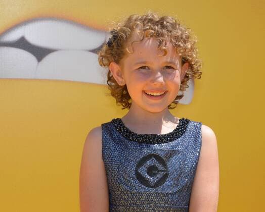 Cast members Nev Scharre, the voice of Agnes in the animated motion picture comedy Despicable Me 3 attend the premiere of the film at the Shrine Auditorium in Los Angeles on June 24, 2017. Storyline: A mysterious stranger shows up to inform Gru that he has a long-lost twin brother-a brother who desperately wishes to follow in his twin s despicable footsteps-one former super-villain will rediscover just how good it feels to be bad.  LAP2017062426 JIMxRUYMEN