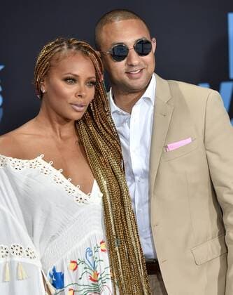 Eva Marcille (L) and guest attend the 17th annual BET Awards at Microsoft Theater in Los Angeles on June 25, 2017. The ceremony celebrates achievements in entertainment and honors music, sports, television, and movies released between April 1, 2016 and March 31, 2017.  LAP20170625484 CHRISTINExCHEW