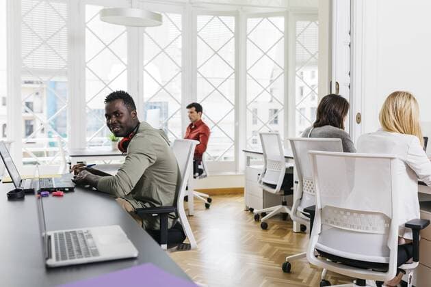 Young people working in start up company Young people working in start up company JRFF01344