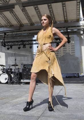 (170629) -- TORONTO, June 29, 2017 -- A model presents a creation by the local indigenous designer during the fashion show of the 2017 Aboriginal History Month Celebration at Yonge-Dundas Square in Toronto, Canada, June 28, 2017. ) (jmmn) CANADA-TORONTO-ABORIGINAL HISTORY MONTH-FASHION SHOW ZouxZheng 