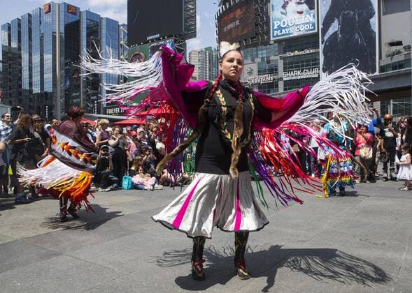 (170629) -- TORONTO, June 29, 2017 -- Performers wearing women s traditional costume dance before the fashion show of the 2017 Aboriginal History Month Celebration at Yonge-Dundas Square in Toronto, Canada, June 28, 2017. ) (jmmn) CANADA-TORONTO-ABORIGINAL HISTORY MONTH-FASHION SHOW ZouxZheng 