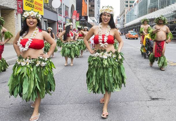 (170702) -- TORONTO, July 2, 2017 -- Dressed up participants perform during the 2017 Canada Day Parade in Toronto, Canada, July 1, 2017. About 1,500 participants in different traditional costumes participated in this event to celebrate Canada s 150th Birthday on Saturday in Toronto. ) (zxj) CANADA-TORONTO-CANADA DAY PARADE ZouxZheng 
