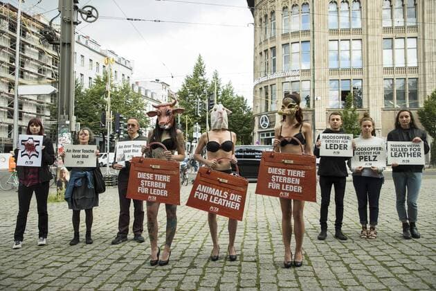 July 4, 2017 - Berlin, Germany - A group of people protest against the use of furs and leather in fashion before the beginning of the Mercedes-Benz Berlin Fashion Week Spring Summer 2018 in front of Jandorf Kaufhaus in Berlin, Germany on July 4, 2017. Berlin Germany  - ZUMAn230 20170704_zaa_n230_131 Copyright: xEmmanuelexContinix