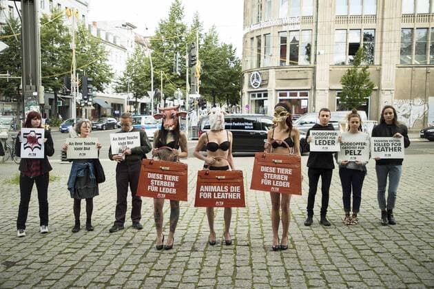 July 4, 2017 - Berlin, Germany - A group of people protest against the use of furs and leather in fashion before the beginning of the Mercedes-Benz Berlin Fashion Week Spring Summer 2018 in front of Jandorf Kaufhaus in Berlin, Germany on July 4, 2017. Berlin Germany  - ZUMAn230 20170704_zaa_n230_151 Copyright: xEmmanuelexContinix