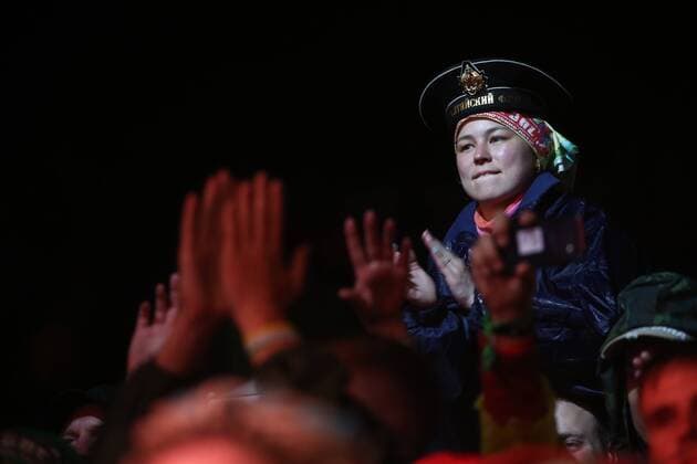 TVER REGION, RUSSIA â€“ JULY 8, 2017: A festival-goer enjoys a performance at the 2017 Nashestvie open air rock music festival. Alexander Ryumin TASS  TS056A5E