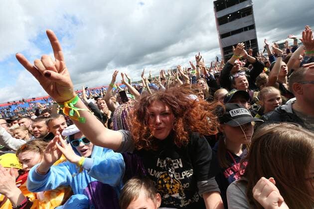 TVER REGION, RUSSIA â€“ JULY 9, 2017: Festival-goers enjoy a performance at the 2017 Nashestvie open air rock music festival. Alexander Ryumin TASS  TS056AE4