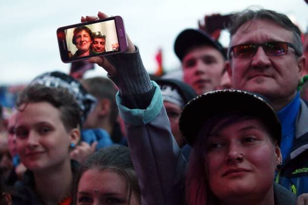 TVER REGION, RUSSIA â€“ JULY 9, 2017: Festival-goers enjoy a performance at the 2017 Nashestvie open air rock music festival. Alexander Ryumin TASS  TS056BDB