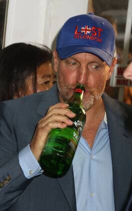 July 10, 2017 - New York, New York, U.S. - Actor WOODY HARRELSON drinks from a bottle of water before he walks the red carpet at the New York premiere of War for the Planet of the Apes held at SVA Theatre, New York U.S. - ZUMAk03_ 20170710_zaf_k03_084 Copyright: xNancyxKaszermanx