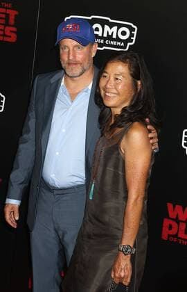 July 10, 2017 - New York, New York, U.S. - Actor WOODY HARRELSON and LAURA LOUIE attend the New York premiere of War for the Planet of the Apes held at SVA Theatre, New York U.S. - ZUMAk03_ 20170710_zaf_k03_091 Copyright: xNancyxKaszermanx