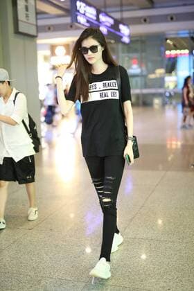 Chinese model He Sui is pictured at the Shanghai Hongqiao International Airport in Shanghai, China, 17 July 2017. Supermodel Hesui showes off her long legs in all-black look at Shanghai airport  pbu653838_13