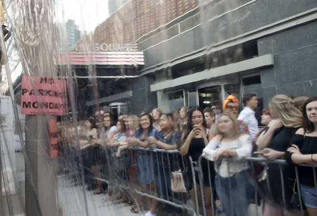 Fans watch the arrivals on the red carpet at the DUNKIRK New York Premiere on July 18, 2017 in New York City.  NYP20170718105 JOHNxANGELILLO