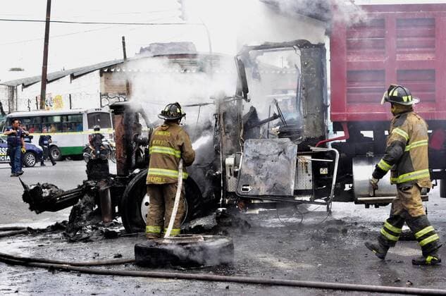 (170721) -- MEXICO CITY, July 21, 2017 -- Firefighters extinguish the flames of a burned truck after an operation of the Navy in Mexico City, capital of Mexico, on July 20, 2017. Eight alleged members of a drug cartel were killed on Thursday in a firefight with army troops in the east of Mexico City, including their suspected leader, Felipe de Jesus Peru Luna, the government announced. Mexico s Secretariat of the Navy and Army issued a statement, saying that the clash happened in the neighborhood of Tlahuac, after the suspects attacked federal police officers. Francisco Canedo) (ce) (jmmn) MEXICO-MEXICO CITY-SECURITY-OPERATION e STR