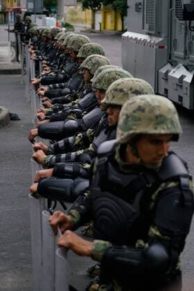 (170721) -- MEXICO CITY, July 21, 2017 -- Mexican Navy members stand guard during an operation in Mexico City, capital of Mexico, on July 20, 2017. Eight alleged members of a drug cartel were killed on Thursday in a firefight with army troops in the east of Mexico City, including their suspected leader, Felipe de Jesus Peru Luna, the government announced. Mexico s Secretariat of the Navy and Army issued a statement, saying that the clash happened in the neighborhood of Tlahuac, after the suspects attacked federal police officers. Francisco Canedo) (ce) (jmmn) MEXICO-MEXICO CITY-SECURITY-OPERATION e FranciscoxCanedo