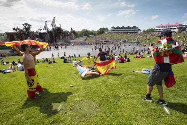 Illustration picture shows Spanish visitors, on the first day of the Tomorrowland music festival, Friday 21 July 2017. The 13th edition of Tomorrowland electronic music festival takes place at the De Schorre terrain in Boom from 20 to 23 July 2017 and from 27 to 30 July 2017.  KOENxBLANCKAERT 05135539