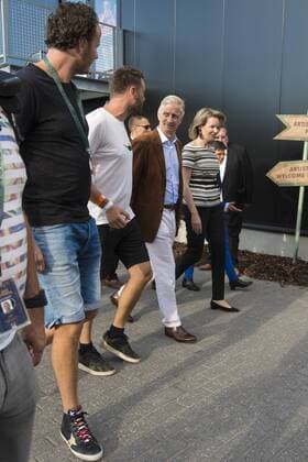 King Philippe - Filip of Belgium and Queen Mathilde of Belgium and the two brothers - owners of Tomorrowland Manu Beers (black T shirt) and Michiel Beers, pictured during a royal visit, on the first day of the Tomorrowland music festival, Friday 21 July 2017. The 13th edition of Tomorrowland electronic music festival takes place at the De Schorre terrain in Boom from 20 to 23 July 2017 and from 27 to 30 July 2017.  KOENxBLANCKAERT 05136083