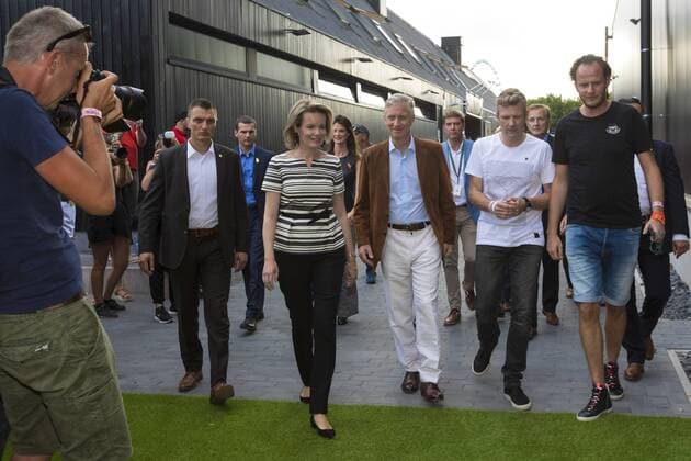 King Philippe - Filip of Belgium and Queen Mathilde of Belgium and Manu Beers (black Tshirt) and PR Frederick Degezelle, pictured during a royal visit on the first day of the Tomorrowland music festival, Friday 21 July 2017. The 13th edition of Tomorrowland electronic music festival takes place at the De Schorre terrain in Boom from 20 to 23 July 2017 and from 27 to 30 July 2017.  KOENxBLANCKAERT 05136091