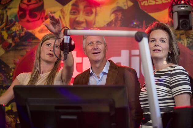 Studio Brussel presenter Eva De Roo and King Philippe - Filip of Belgium and Queen Mathilde of Belgium pictured during a royal visit to the Studio Brussel studio, on the first day of the Tomorrowland music festival, Friday 21 July 2017. The 13th edition of Tomorrowland electronic music festival takes place at the De Schorre terrain in Boom from 20 to 23 July 2017 and from 27 to 30 July 2017.  KOENxBLANCKAERT 05136075