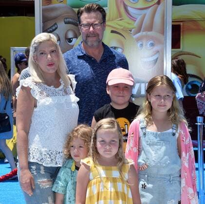 Actress Tori Spelling and her husband Dean McDermott and their children Finn McDermott, Liam McDermott, Stella McDermott and Hattie McDermott attend the premiere of the animated motion picture comedy The Emoji Movie at the Regency Village Theatre in the Westwood section of Los Angeles on July 23, 2017. Storyline: Gene, a multi-expressional emoji, sets out on a journey to become a normal emoji.  LAP2017072351 JIMxRUYMEN