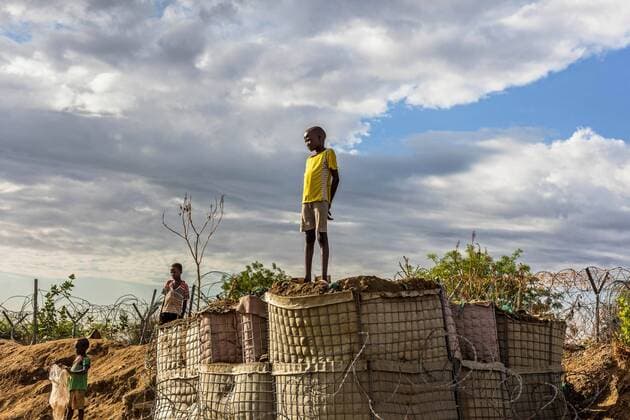 - Protection of Civilians site in Juba, South Sudan - 28 03 2017 - South Sudan Juba - Sheltered under the watch of UN Peacekeepers and bordered by rows of rolled, barbed razor wire, some residents describe the PoC as an open-air prison .  NataliaxJidovanux xLexPictorium LePictorium_0162064