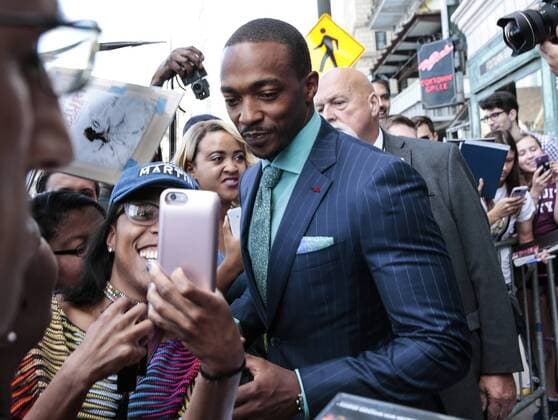 July 25, 2017 - Detroit, MI, USA - Mia Shepherd of Detroit, center left, takes a selfie with Anthony Mackie during the Detroit movie world premiere at the Fox Theatre in Detroit on Tuesday, July 25, 2017. Detroit USA - ZUMAm67_ 20170725_zaf_m67_033 Copyright: xJunfuxHanx