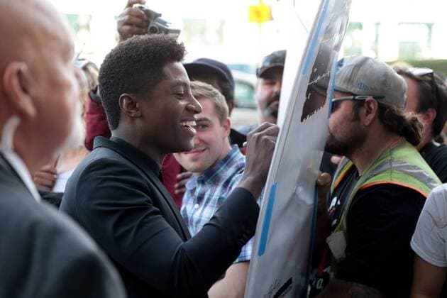 July 25, 2017 - Detroit, MI, USA - Actor Joseph David Jones signs autographs while arriving for the world premiere of Detroit, directed by Kathryn Bigelow at the Fox Theatre in Detroit on Tuesday, July 25, 2017. Detroit USA - ZUMAm67_ 20170725_zaf_m67_036 Copyright: xRyanxGarzax