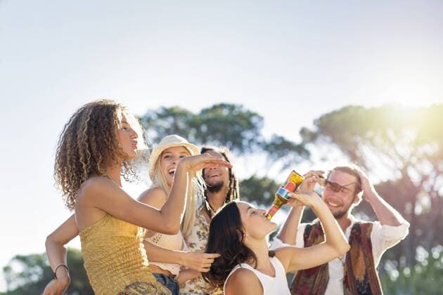 Happy young people outdoors having a good time model released Symbolfoto  ZEF13910