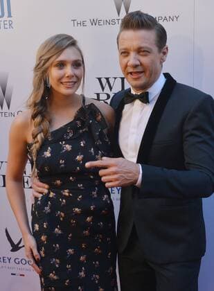 Cast members Elizabeth Olsen and Jeremy Renner attend the premiere of the motion picture crime thriller Wind River at The Theatre at Ace Hotel in downtown Los Angeles on July 26, 2017. Storyline: An FBI agent teams with a town s veteran game tracker to investigate a murder that occurred on a Native American reservation.  LAP2017072631 JIMxRUYMEN
