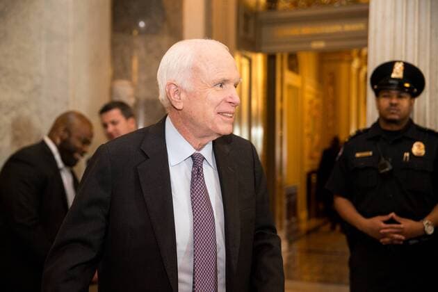 Sen. John McCain (R-AZ) leaves the Senate floor during debate on healthcare reform and repeal on Capitol Hill in Washington, DC on July 27, 2017.  WAS20170727525 ERINxSCHAFF