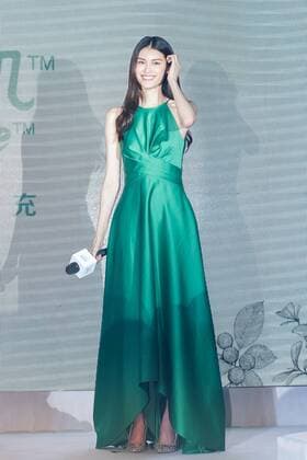 Chinese model He Sui attends a promotional event for Foodcode in Shanghai, China, 28 July 2017. Supermodel He Sui glams up in green satin dress to endorse Foodcode in Shanghai  pbu659186_05