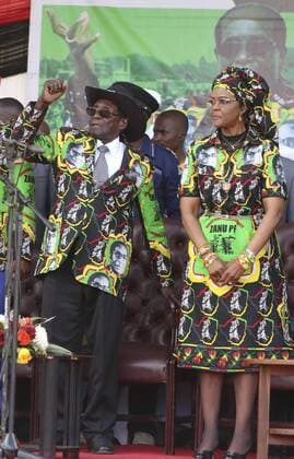 (170730) -- CHINHOYI (ZIMBABWE), July 30, 2017 -- Zimbabwean President Robert Mugabe (L) and his wife Grace Mugabe attend a ZANU-PF rally in Chinhoyi, Mashonaland West, Zimbabwe, July 29, 2017. Zimbabwean President Robert Mugabe said on Saturday he is not about to step down leaving behind a fractured party. He said he was taking his time to anoint a successor until he is convinced that the party is united and that the person to succeed him has attained the same stature and acceptance as I have managed to secure over the years for the party . ) (zw) ZIMBABWE-CHINHOYI-MUGABE stringer 