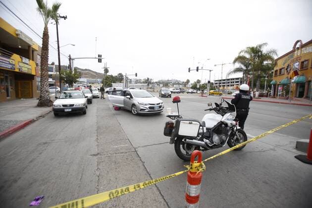 July 31, 2017 - Tijuana, Baja California, Mexico - Tijuana, Baja California, USA July 31st, 2017 Opening of the Pedwest pedestrian entrance into Tijuana, Mexico. The transit police close the street towards Chaparral. Passengers are dropped off at the police tape. Ã‚Â© The San Diego Union Tribune 2017 Tijuana Mexico - ZUMAs44_ 20170731_zaf_s44_001 Copyright: xAlejandroxTamayox
