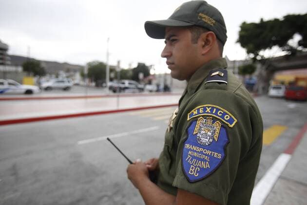 July 31, 2017 - Tijuana, Baja California, Mexico - Tijuana, Baja California, USA July 31st, 2017 Opening of the Pedwest pedestrian entrance into Tijuana, Mexico. A transit police controls traffic at Chaparral area. Ã‚Â© The San Diego Union Tribune 2017 Tijuana Mexico - ZUMAs44_ 20170731_zaf_s44_008 Copyright: xAlejandroxTamayox