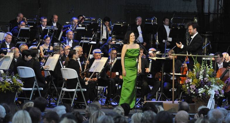 Slovak classical soprano Simona Saturova (center) performs with the Brno Philharmonic Orchestra during the Spilberk International Music Festival in Brno, Czech Republic, on August 13, 2017. On the right side is seen Polish conductor Lukasz Borowicz. (CTKxPhoto IgorxZehl) CTKPhotoP201708130499001  zeh