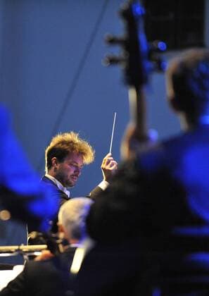Polish conductor Lukasz Borowicz performs with the Brno Philharmonic Orchestra during the Spilberk International Music Festival in Brno, Czech Republic, on August 13, 2017. (CTKxPhoto IgorxZehl) CTKPhotoP201708130511001  zeh