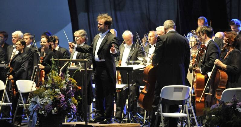 Polish conductor Lukasz Borowicz (center) performs with the Brno Philharmonic Orchestra during the Spilberk International Music Festival in Brno, Czech Republic, on August 13, 2017. (CTKxPhoto IgorxZehl) CTKPhotoP201708130538101  zeh
