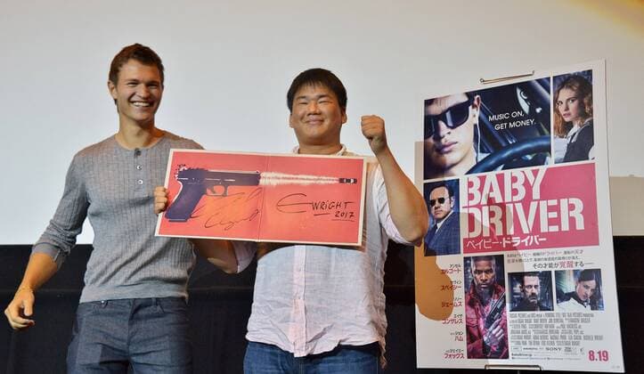 Actor Ansel Elgort poses for camera with Japanese fan during the stage greeting for the film Baby Driver opening day in Tokyo, Japan on August 19, 2017.  TKP2017081917 KEIZOxMORI