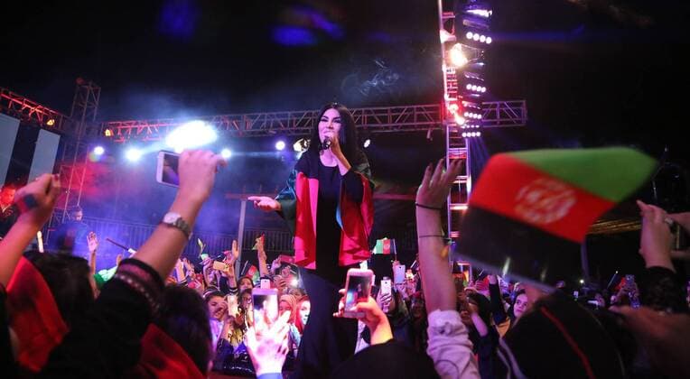 (170820) -- KABUL, Aug. 20, 2017 -- Afghan female singer Aryana Saeed (C) performs during a concert to celebrate the 98th Independence Day anniversary of Afghanistan in Kabul, Afghanistan, on Aug. 19, 2017. It is the first time over the past 16 years that Afghans celebrate their Independence Day with a music concert in the country where Taliban militants and like-minded groups have been fighting to regain power and re-impose strict laws to ban cultural festivals and women activities. )(zhf) AFGHANISTAN-KABUL-INDEPENDENCE DAY-CONCERT-CELEBRATION RahmatxAlizadah 
