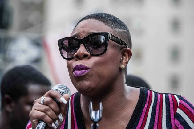 August 23, 2017 - New York City, New York, United States of America - Simone Sanders. New Yorkers rallied behind now-unsigned NFL player Colin Kaepernick who has remained seated during the singing of the US National Anthem since 2016. Kaepernick has stated I am not going to stand up to show pride in a flag for a country that oppresses black people and people of color.Ã¢â‚¬Â Kaepernick exercised his free agency option with the San Francisco 49ers and remains unsigned, which some see as a sign of a blacklisting in the NFL. Calls against Verizon were also made due to its 130 million in advertising with the NFL. New York City United States of America - ZUMAb160 20170823_zbp_b160_007 Copyright: xSachellexBabbarx