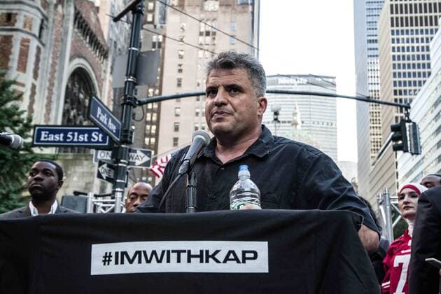 August 23, 2017 - New York City, New York, United States of America - Dave Zaran of The NationNew Yorkers rallied behind now-unsigned NFL player Colin Kaepernick who has remained seated during the singing of the US National Anthem since 2016. Kaepernick has stated I am not going to stand up to show pride in a flag for a country that oppresses black people and people of color.Ã¢â‚¬Â Kaepernick exercised his free agency option with the San Francisco 49ers and remains unsigned, which some see as a sign of a blacklisting in the NFL. Calls against Verizon were also made due to its 130 million in advertising with the NFL. New York City United States of America - ZUMAb160 20170823_zbp_b160_052 Copyright: xSachellexBabbarx