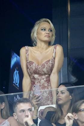 The French player Adil Rami came out on injury in the 25th minute of the match between OM and Domzale. Right after the match, the OM defender was joined by American actress Pamela Anderson. The companion of the French player attended, Thursday evening, for the first time, a match at the Vélodrome, Marseille, France. Pamela Anderson Marseille France  541727