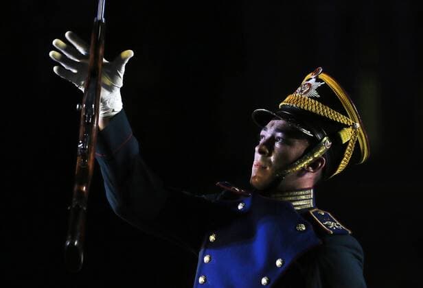 MOSCOW, RUSSIA - AUGUST 26, 2017: A member of the Honor Guard of the Russian Presidential Regiment performs at the opening ceremony of the 2017 Spasskaya Tower international military music festival in Moscow s Red Square. Sergei Savostyanov TASS  TS05D0C1
