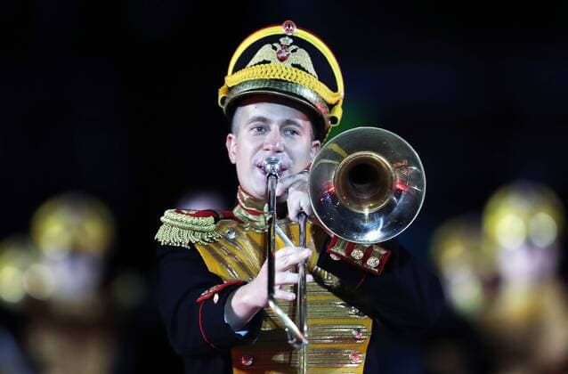 MOSCOW, RUSSIA - AUGUST 26, 2017: A member of the Russian Defence Ministry s Central Military Band performs at the opening ceremony of the 2017 Spasskaya Tower international military music festival in Moscow s Red Square. Sergei Savostyanov TASS  TS05D106