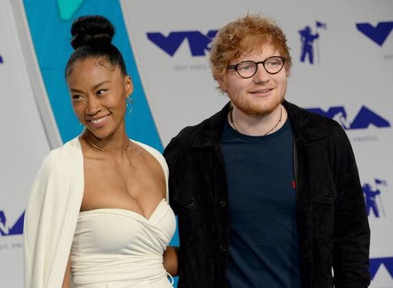 (L-R) Jennie Pegouskie and Ed Sheeran arrive for the 34th annual MTV Video Music Awards at The Forum in Inglewood, California on August 27, 2017.  LAP201708270206 JIMxRUYMEN