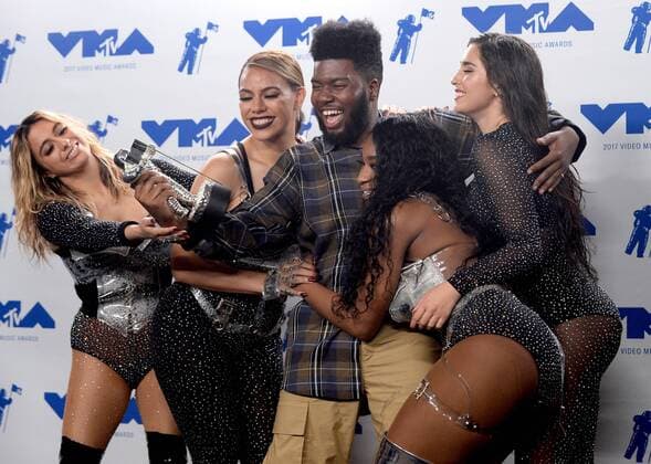 Khalid (C), winner of Best New Artist, and (L-R) Ally Brooke, Dinah Jane, Normani Kordei and Lauren Jauregui of Fifth Harmony, winners of Best Pop for Down , appear backstage during the 34th annual MTV Video Music Awards at The Forum in Inglewood, California on August 27, 2017.  LAP201708270481 JIMxRUYMEN