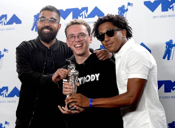 (L-R) 6ix, Logic and Damian Lemar Hudson, winners of the Best Fight Against The System award for Black Spiderman , appear backstage during the 34th annual MTV Video Music Awards at The Forum in Inglewood, California on August 27, 2017.  LAP201708270551 JIMxRUYMEN