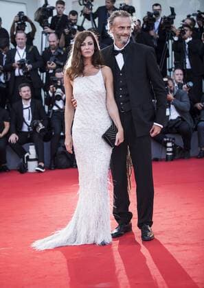 (170830) -- VENICE, Aug. 30, 2017 -- Actress and the jury member of the 74th edition of the Venice Film Festival competition Anna Mouglalis (L) arrives on the red carpet of the premiere of the film Downsizing which opens the 74th edition of the Venice Film Festival in Venice, Italy, on Aug. 30, 2017. The 74th edition of the Venice Film Festival lasts from Aug. 30 to Sept. 9. ) ITALY-VENICE-FILM FESTIVAL-OPENING CEREMONY-RED CARPET JinxYu 