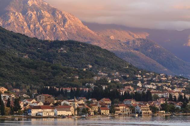 Town at sunset on the stunningly beautiful Bay of Kotor (Boka Kotorska) at sunset, UNESCO World Heritage Site, Montenegro, Europe Copyright: EleanorxScriven 1167-1463
